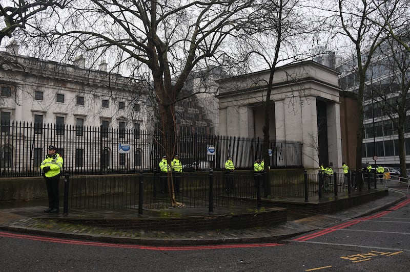 Police stand outside Royal Mint Court, the controversial site of China's proposed new "super-embassy" in London, on Feb. 8, 2025.